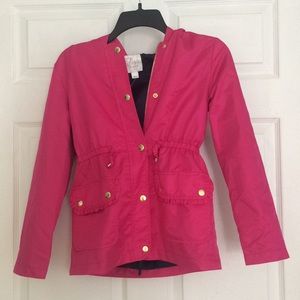 Child’s pink rain coat